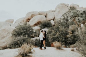 Couple hugging in the desert